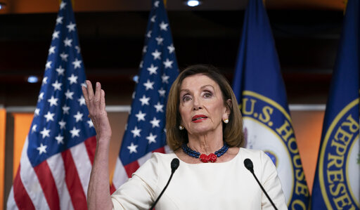 Speaker of the House Nancy Pelosi, D-Calif., addresses reporters at the Capitol in Washington, Thursday, Sept. 26, 2019, as Acting Director of National Intelligence Joseph Maguire appears before the House Intelligence Committee about a secret whistleblower complaint involving President Donald Trump. Pelosi committed Tuesday to launching a formal impeachment inquiry against Trump. (AP Photo/J. Scott Applewhite)