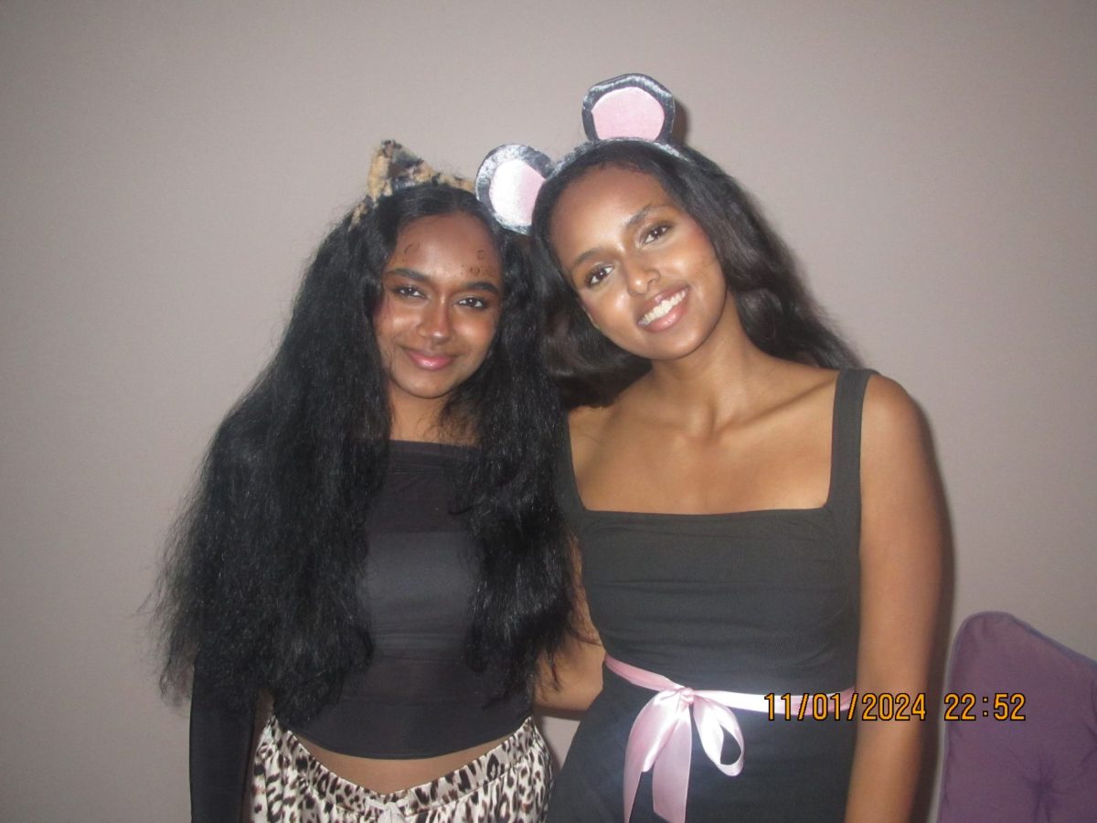 Patriot Press Editor Ria Naraian, and Staff Writer Leah Yacob are featured above in animal inspired costumes.