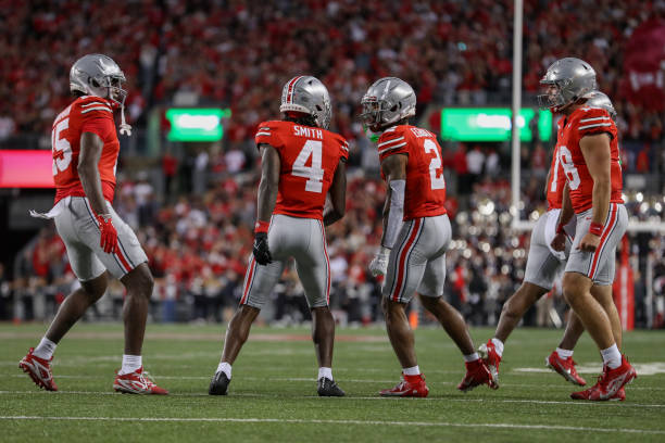 COLUMBUS, OH - SEPTEMBER 07: Ohio State Buckeyes wide receiver Jeremiah Smith (4) reacts with wide receiver Emeka Egbuka (2) after scoring a touchdown during the game against the Western Michigan Broncos and the Ohio State Buckeyes on September 7, 2024, at Ohio Stadium in Columbus, OH. (Photo by Ian Johnson/Icon Sportswire via Getty Images)