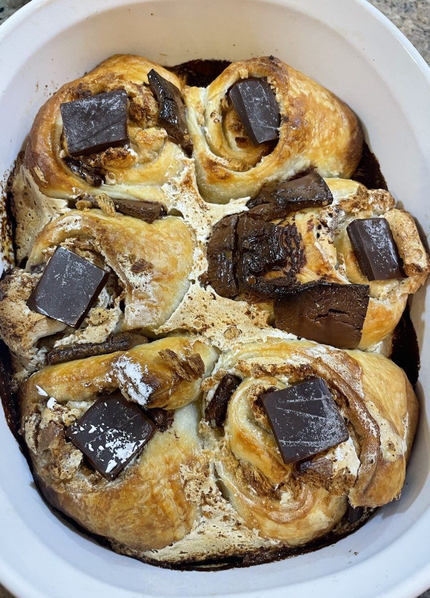 Bake at 400º F for about 30 minutes or until golden brown (or according to the puff pastry package), checking every so often to ensure the rolls don’t over bake. Once out of the oven, immediately top each roll with a piece of chocolate. 