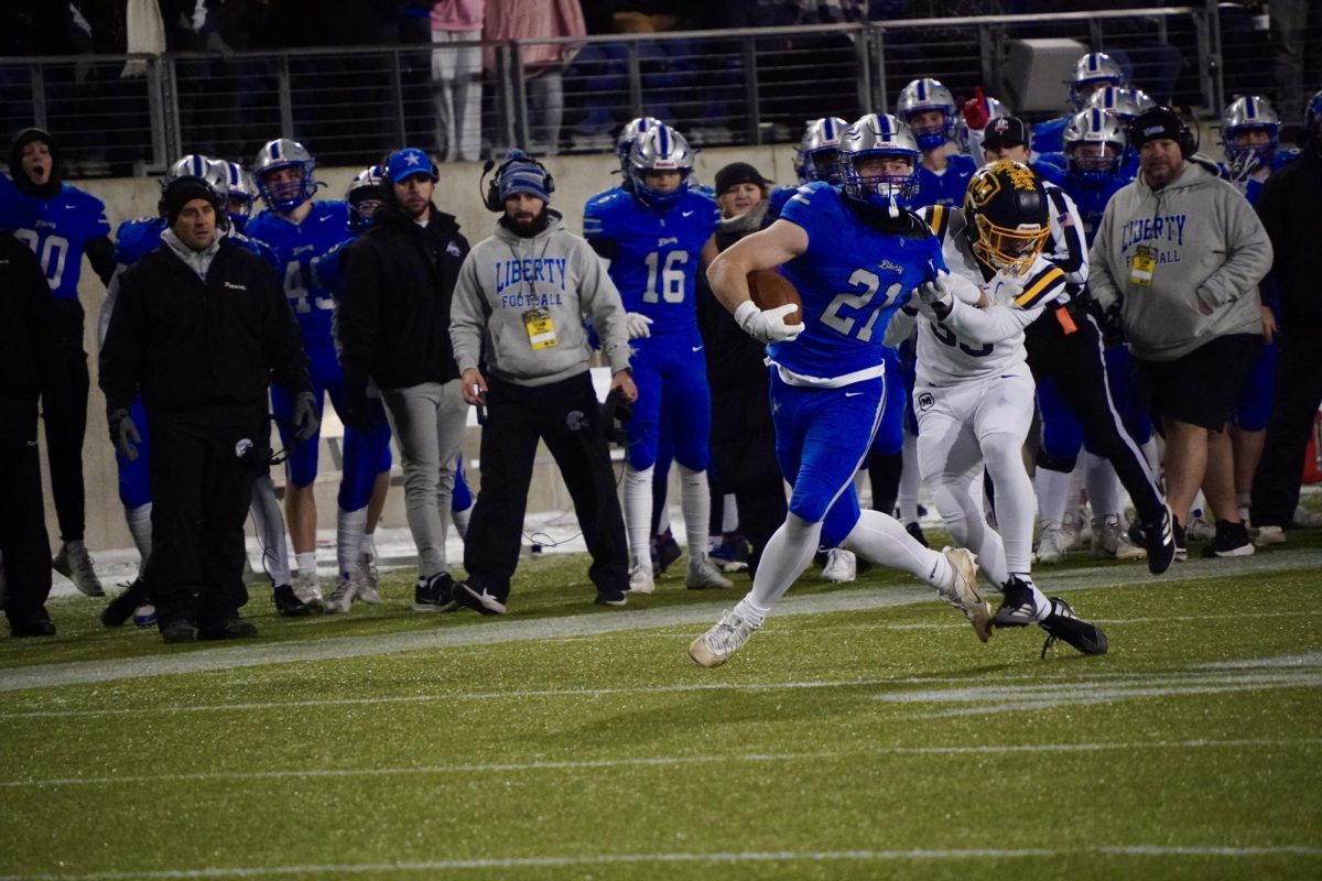 Senior running back Jake Struck takes off for a huge gain. Struck had 99 rushing yards, 74 receiving yards, and a touchdown. "I started playing football because my dad played and I just stuck with it ever since," Struck said.