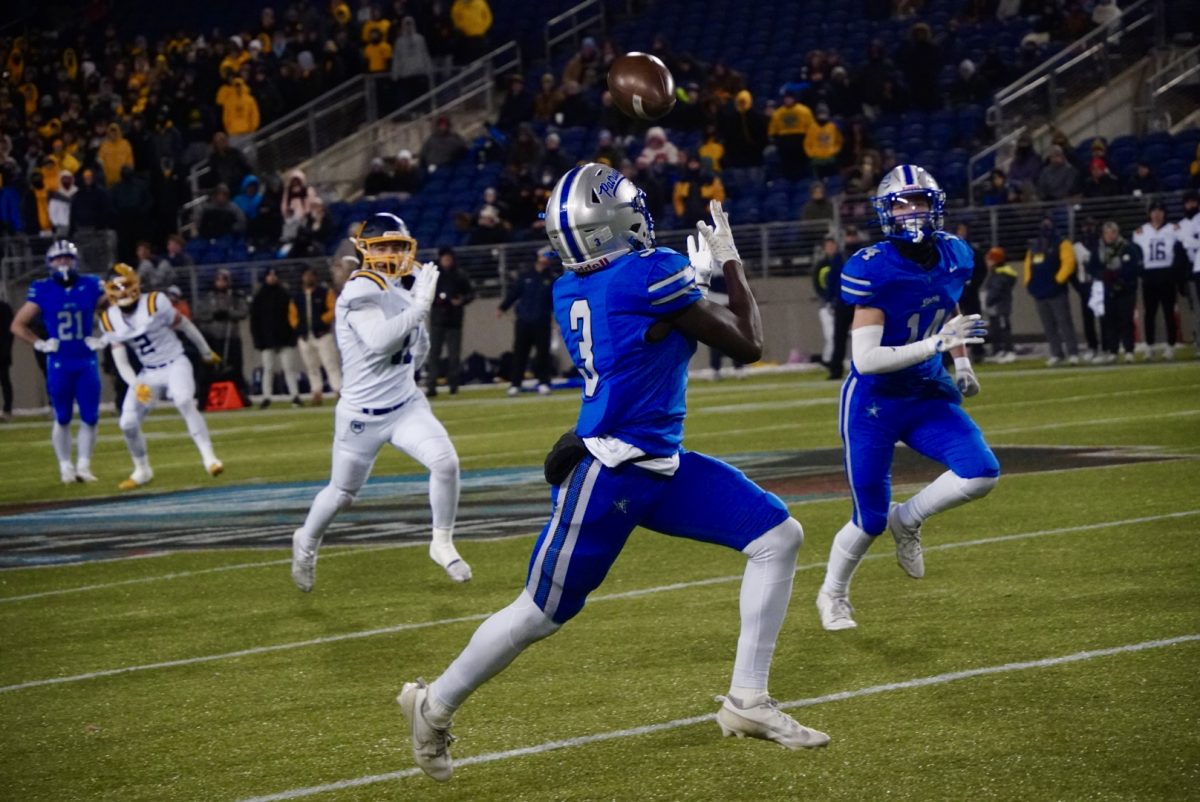 Senior wide receiver Christian Moulton catches a deep ball from Andrew Leonard for a 65 yard touchdown. Moulton had 8 catches for 168 yards and 3 touchdowns. "Football is a once in a lifetime experience that you can't get anywhere else," Moulton said.