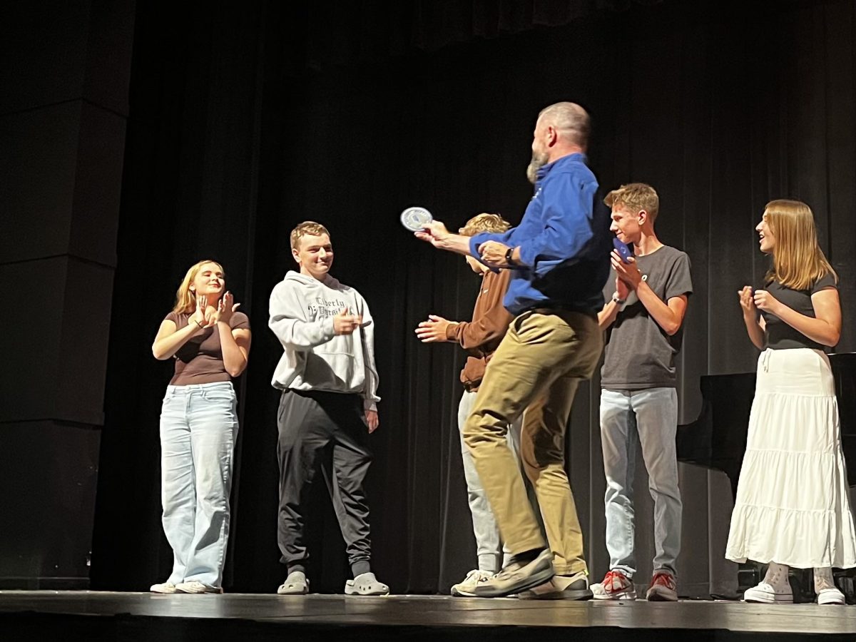 Varsity Chorale Inducts New Members