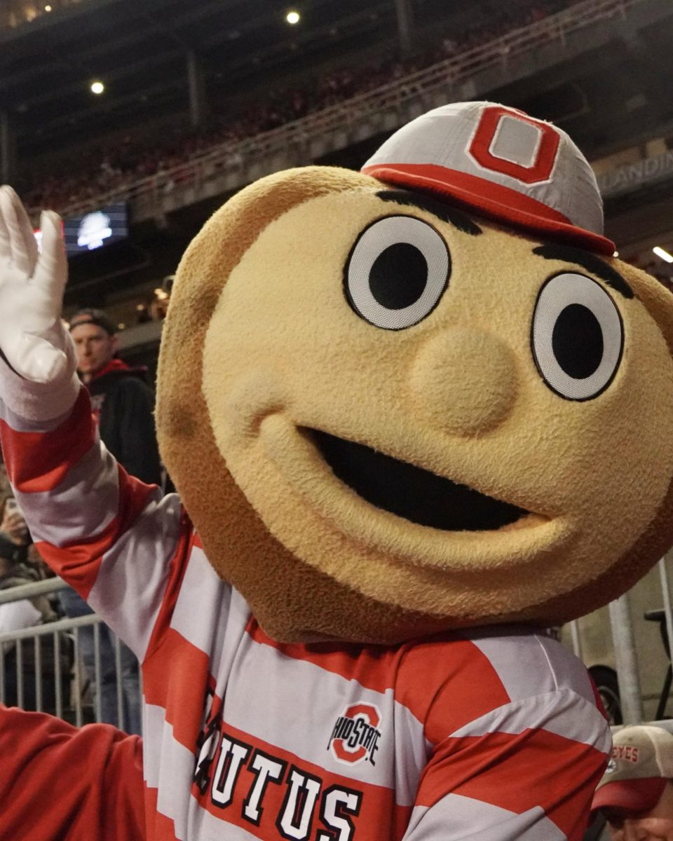Team mascot Brutus the Buckeye waves to the camera. Brutus did not record any stats in this game.