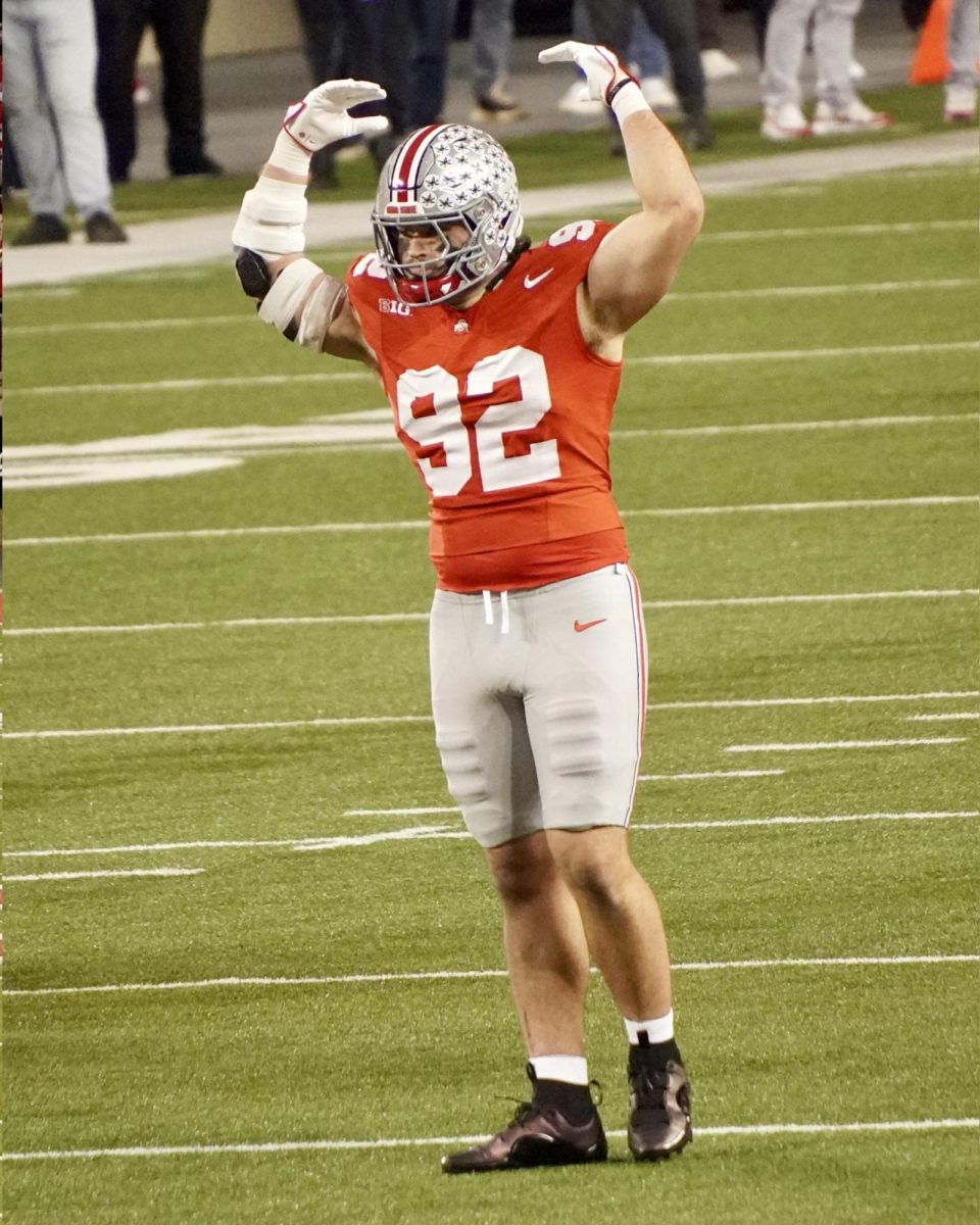 Senior defensive end Caden Curry hypes the crowd up before the first snap. Curry caused the first Ohio State blocked punt since last season against Northwestern.