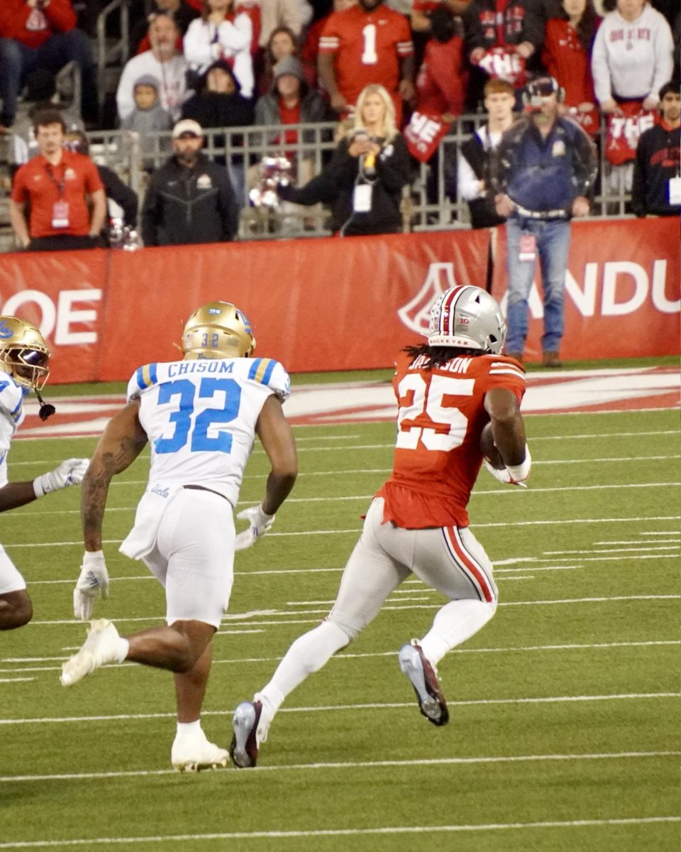 Freshman running back Bo Jackson bursts away from the defense. Jackson carried the ball 15 times for 112 yards and a touchdown.